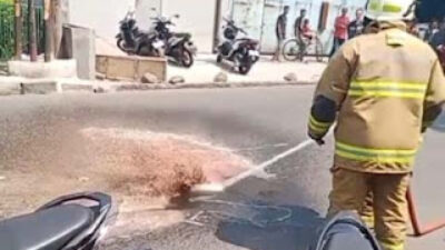 TKP kecelakaan maut di Jalan Caringin menewaskan pengendara motor usai terlindas truk tronton.