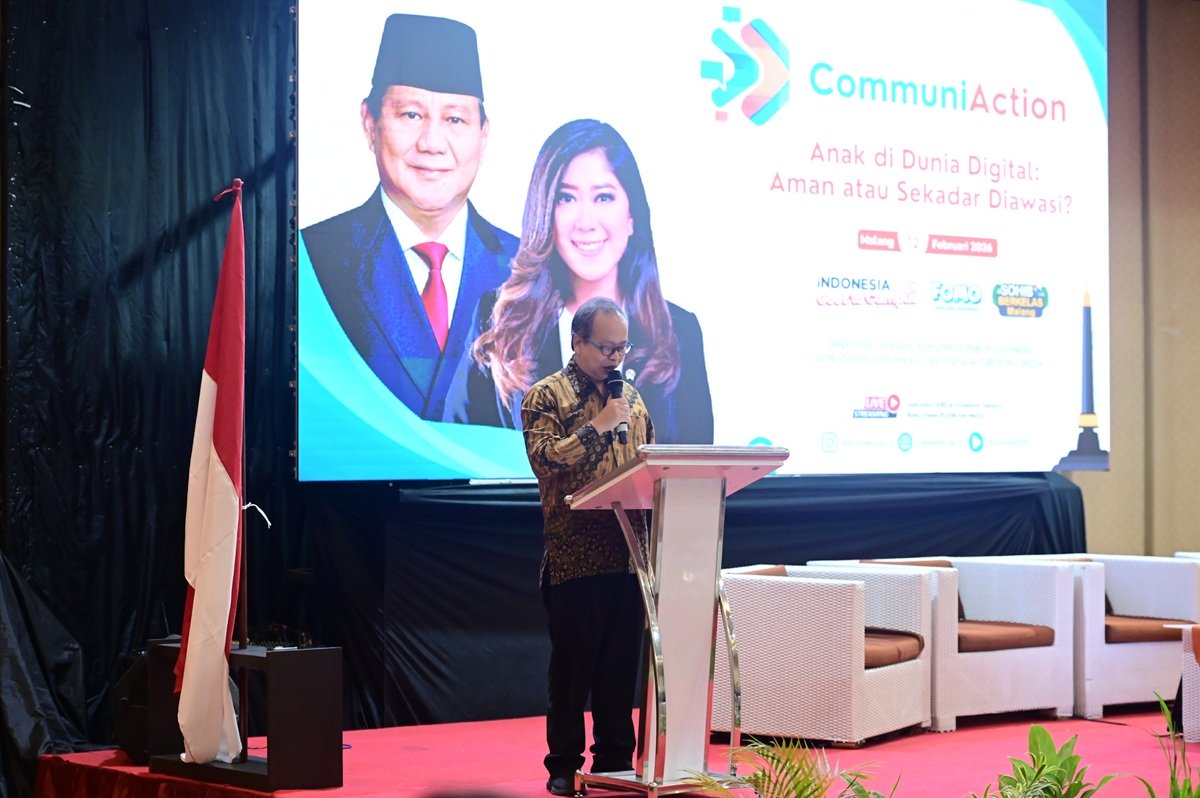 Direktur Informasi Publik Ditjen KPM Komdigi, Nursodik Gunarjo membuka kegiatan CommuniAction Malang. 12 Februari 2026.