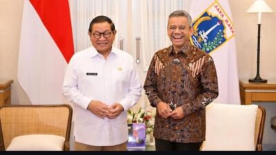 Menkeu Suahasil dan Gubernur DKI Pramono.